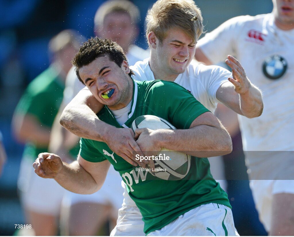 3 April 2013; Cian Kelleher, Ireland, is tackled by Tom Hudson, England. U19 Friendly, Ireland U19 v England U19, Donnybrook Stadium, Donnybrook, Dublin. Picture credit: Brian Lawless / SPORTSFILE