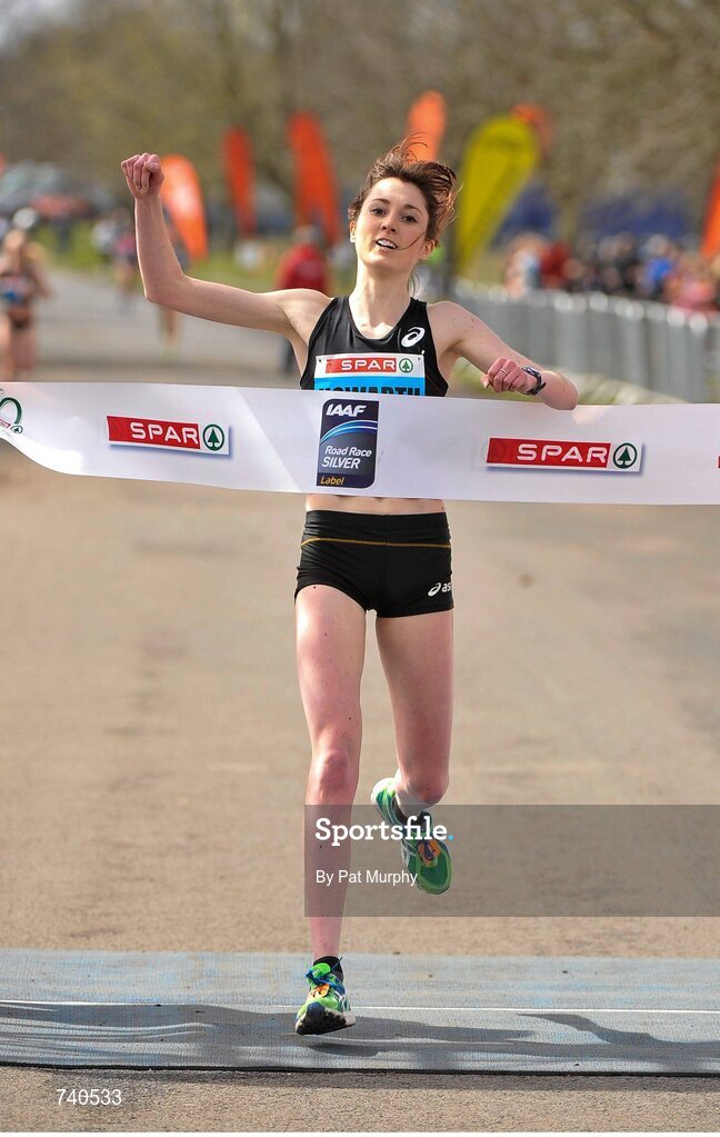 14 April 2013; Lauren Howarth, Great Britain, Leigh Harriers AC, crosses the finish line to win Elite Women's Race at the SPAR Great Ireland Run 2013. Phoenix Park, Dublin. Picture credit: Pat Murphy / SPORTSFILE