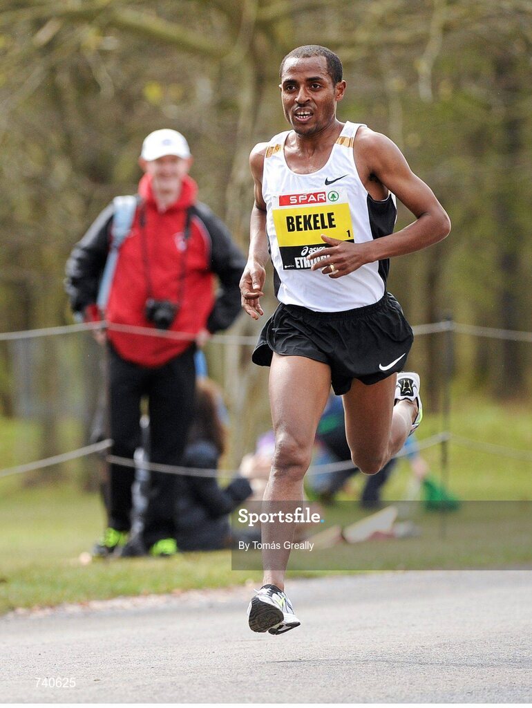 14 April 2013; Kenenisa Bekele, Ethiopia, on his way to winning the SPAR Great Ireland Run 2013. Phoenix Park, Dublin. Picture credit: Tomás Greally / SPORTSFILE