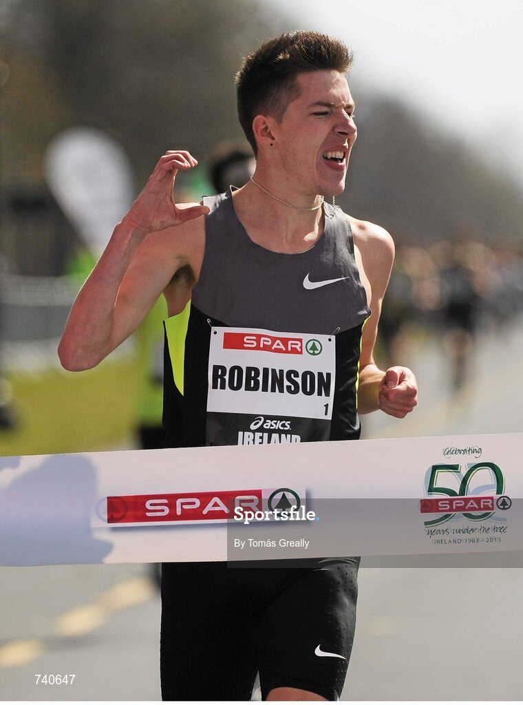 14 April 2013; Paul Robinson, St. Coca's A.C, on his way to winning the Elite Mens Mile event. SPAR Great Ireland Run 2013. Phoenix Park, Dublin. Picture credit: Tomás Greally / SPORTSFILE