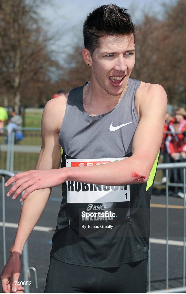 14 April 2013; Paul Robinson, St. Coca's A.C, after winning the Elite Mens Mile event. SPAR Great Ireland Run 2013. Phoenix Park, Dublin. Picture credit: Tomás Greally / SPORTSFILE