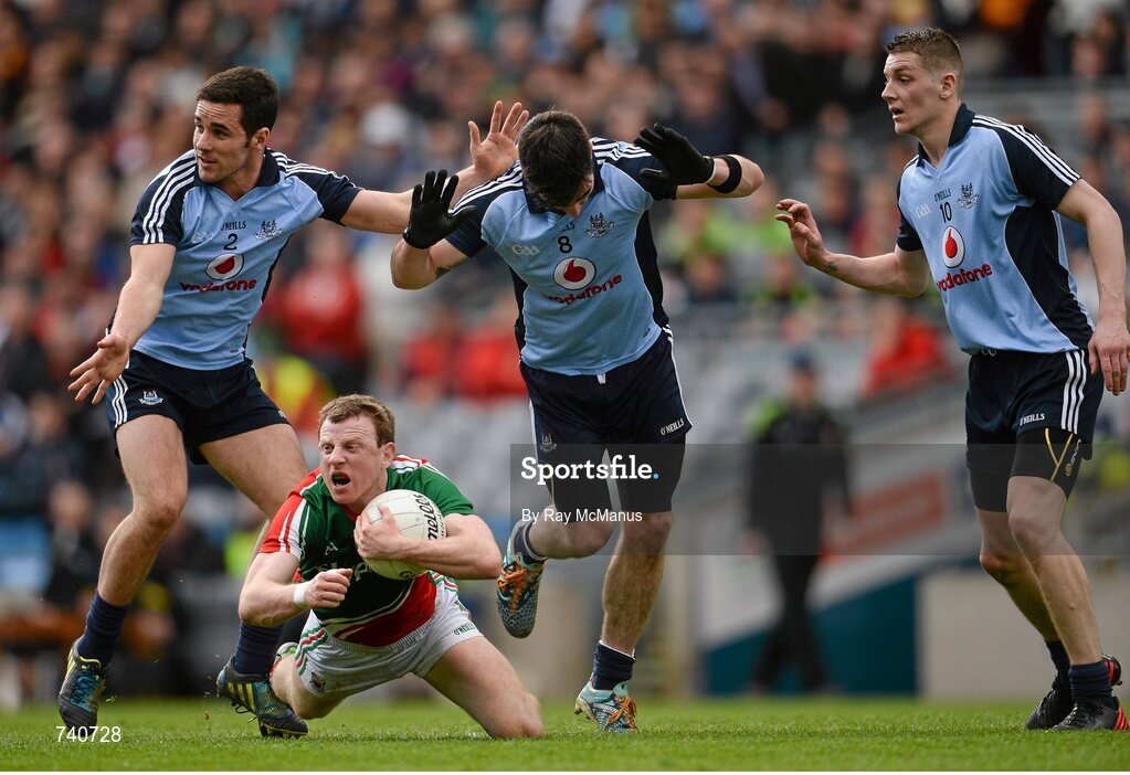 14 April 2013; Colm Boyle, Mayo, in action against Kevin O'Brien, left, Michael Darragh Macauley and Jason Whelan, right, Dublin. Allianz Football League, Division 1, Semi-Final, Dublin v Mayo, Croke Park, Dublin. Picture credit: Ray McManus / SPORTSFILE