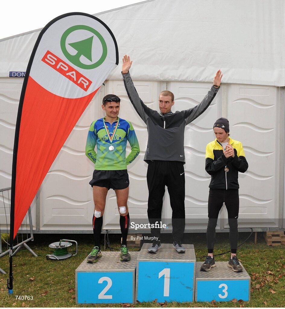 14 April 2013; Stephen Scullion, North Belfast Harriers, winner of the Irish National Championships at the SPAR Great Ireland Run 2013, with second placed Sergiu Cibanu, Clonliffe Harriers, left, and third placed Eddie McGinley, Annadale Striders, right. Phoenix Park, Dublin. Picture credit: Pat Murphy / SPORTSFILE