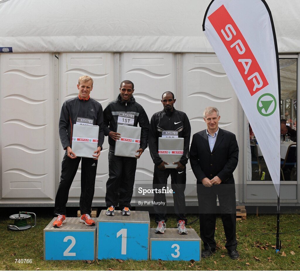 14 April 2013; Winner of the SPAR Great Ireland Run 2013 Kenenisa Bekele, Ethiopia, with second placed Sergiy Lebid, Ukraine, left, third placed Ibrahim Jeilan, Ethiopia, right, and Willie O'Byrne, Managing Director of SPAR Ireland. Phoenix Park, Dublin. Picture credit: Pat Murphy / SPORTSFILE