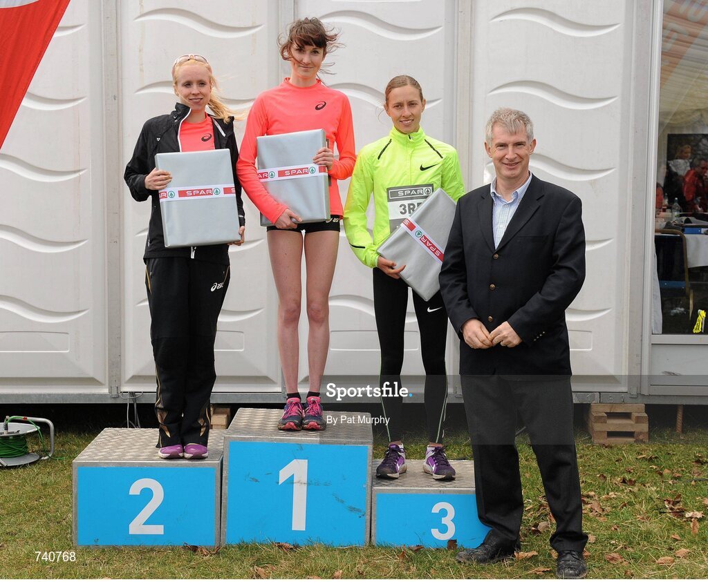 14 April 2013; Winner of the SPAR Great Ireland Run 2013 Women's race Lauren Howarth, Great Britain, with, from left, second placed Gemma Steel, Great Britain, third placed Julia Bleasdale, Great Britain, and Willie O'Byrne, Managing Director of SPAR Ireland. Phoenix Park, Dublin. Picture credit: Pat Murphy / SPORTSFILE