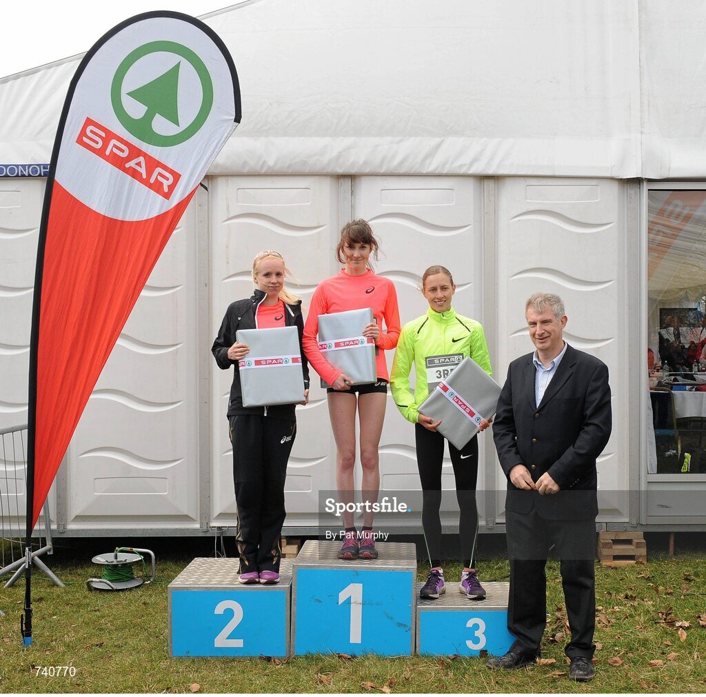 14 April 2013; Winner of the SPAR Great Ireland Run 2013 Women's race Lauren Howarth, Great Britain, with, from left, second placed Gemma Steel, Great Britain, third placed Julia Bleasdale, Great Britain, and Willie O'Byrne, Managing Director of SPAR Ireland. Phoenix Park, Dublin. Picture credit: Pat Murphy / SPORTSFILE