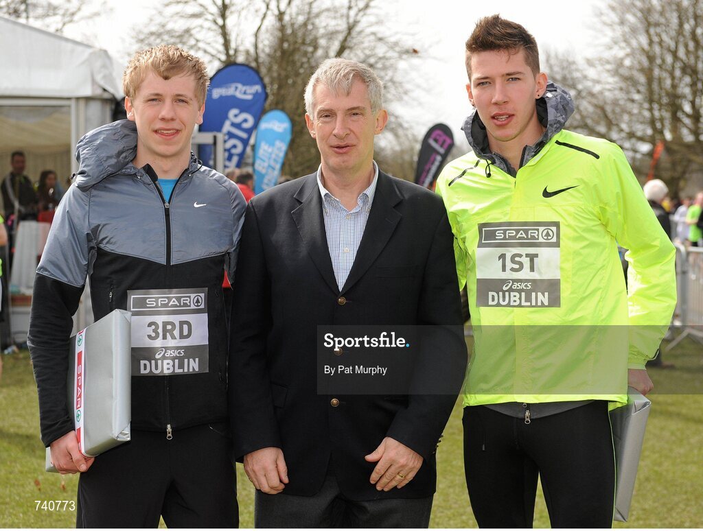 14 April 2013; Paul Robinson, St. Coca's AC, right, winner of the Elite Men's Mile event at the SPAR Great Ireland Run 2013, with third placed David Harper, Westport AC, left, and Willie O'Byrne, Managing Director of SPAR Ireland, centre. Phoenix Park, Dublin. Picture credit: Pat Murphy / SPORTSFILE