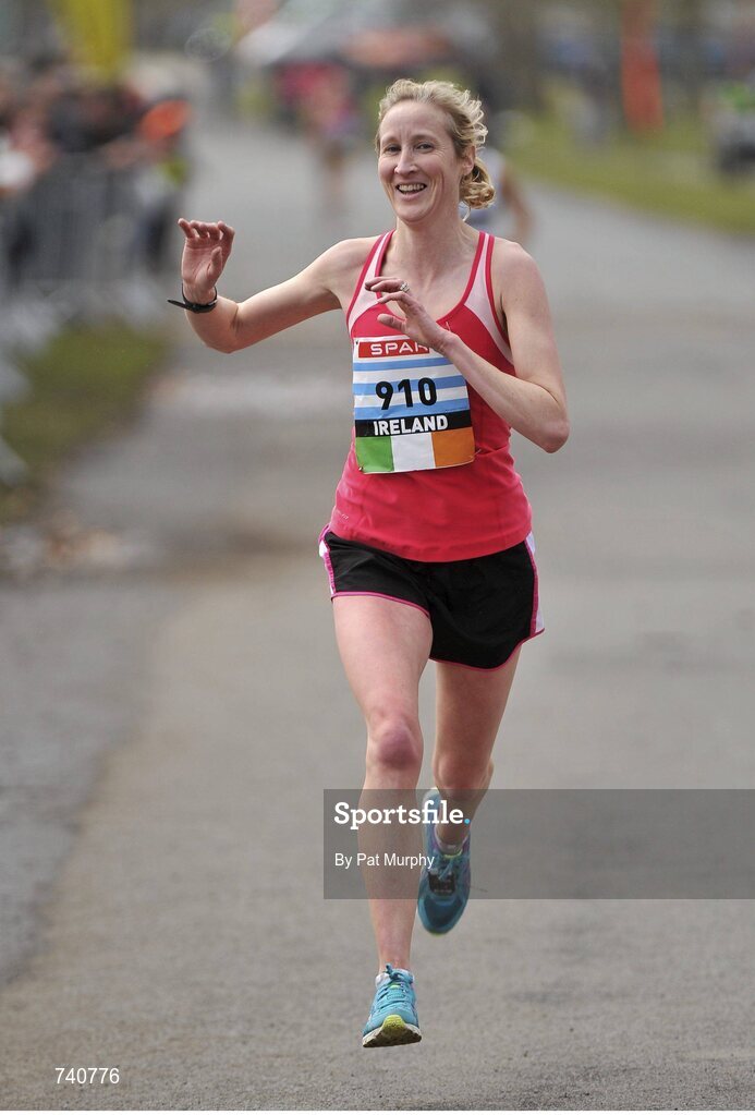 14 April 2013; Catherina McKiernan crosses the finish line during the Elite Women's event at the SPAR Great Ireland Run 2013. Phoenix Park, Dublin. Picture credit: Pat Murphy / SPORTSFILE