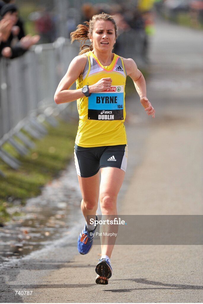 14 April 2013; Linda Byrne, crosses the finish line to win the Irish National Championships during the SPAR Great Ireland Run 2013. Phoenix Park, Dublin. Picture credit: Pat Murphy / SPORTSFILE