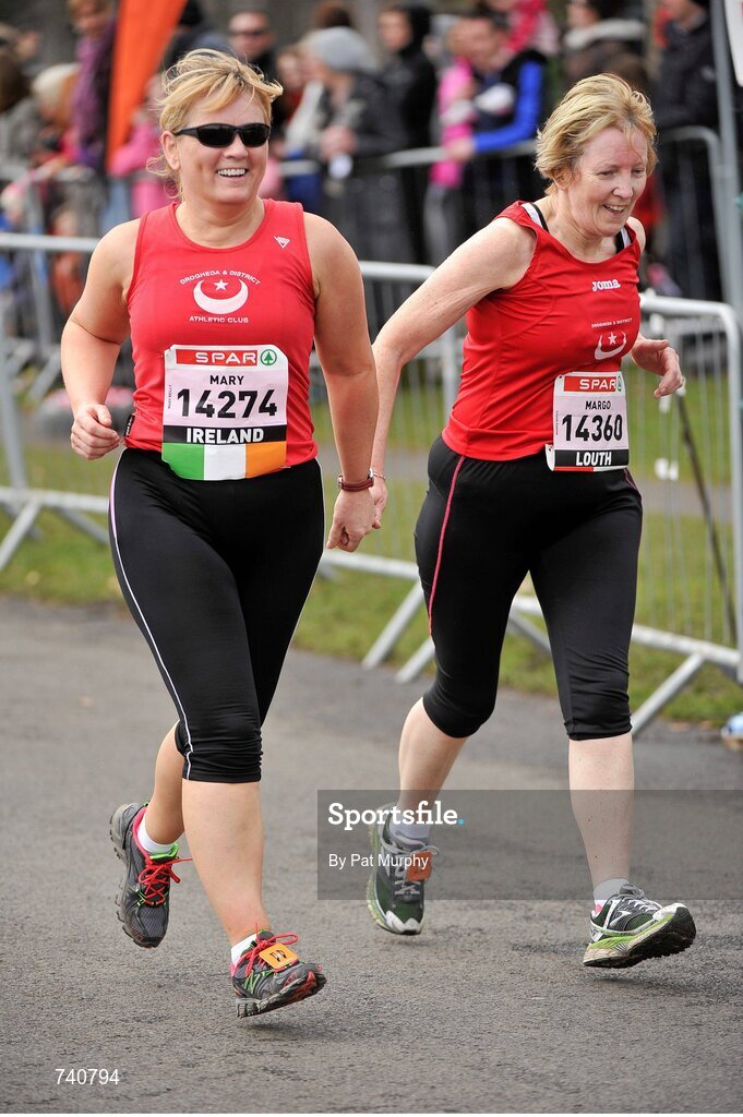 14 April 2013; Mary Reilly, left, and Margo Duffy, both from Louth, competing in the SPAR Great Ireland Run 2013. Phoenix Park, Dublin. Picture credit: Pat Murphy / SPORTSFILE