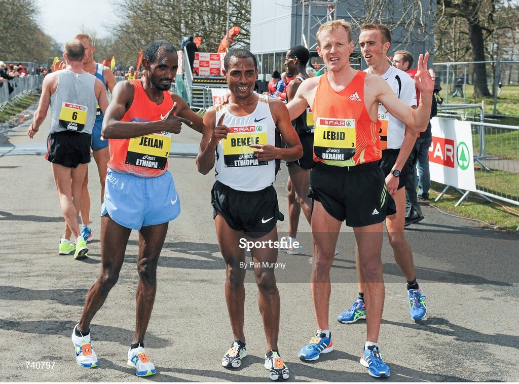 14 April 2013; Winner of the SPAR Great Ireland Run 2013 Kenenisa Bekele, Ethiopia, with second placed Sergiy Lebid, Ukraine, right, and third placed Ibrahim Jeilan, Ethiopia, left. Phoenix Park, Dublin. Picture credit: Pat Murphy / SPORTSFILE