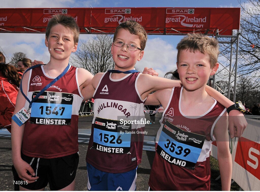 14 April 2013; Winner of the SPAR Mini Great Ireland Run 2013 Eoin Quinn, centre, with second placed Andrew Shaw, right, and third placed Andrew Daily, all from Mullingar Harriers A.C., Co. Westmeath. Phoenix Park, Dublin. Picture credit: Tomás Greally / SPORTSFILE