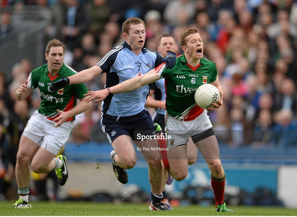 14 April 2013; Donal Vaughan, Mayo, is tackled by Jack McCaffrey, Dublin. Allianz Football League, Division 1, Semi-Final, Dublin v Mayo, Croke Park, Dublin. Picture credit: Ray McManus / SPORTSFILE