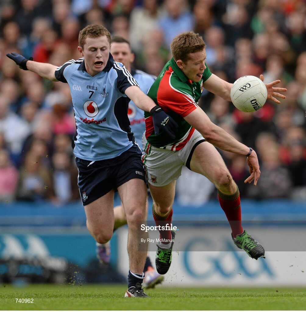 14 April 2013; Donal Vaughan, Mayo, is tackled by Jack McCaffrey, Dublin. Allianz Football League, Division 1, Semi-Final, Dublin v Mayo, Croke Park, Dublin. Picture credit: Ray McManus / SPORTSFILE