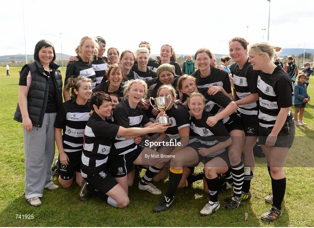 20 April 2013; Old Belvedere captain Carol Murphy lifts the Paul Flood Cup as her team-mates celebrate. Paul Flood Cup Final, Old Belvedere v Galwegians, Seapoint RFC, Killiney, Co. Dublin. Picture credit: Matt Browne / SPORTSFILE
