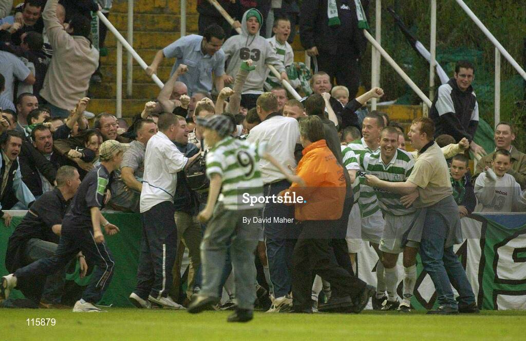 13 June 2003; Shamrock Rovers supporters and players celebrates after their side's first goal, scored by Tony Grant, during the Eircom League Premier Division match between Shamrock Rovers and St Patrick's Athletic at Richmond Park in Dublin. Photo by David Maher/Sportsfile