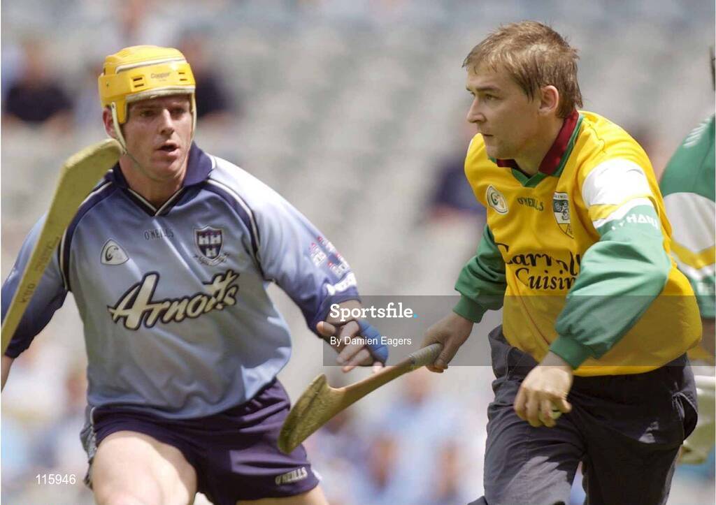 15 June 2003; Offaly goalkeeper Brian Mullins in action against Kevin O'Donoghue of Dublin during the Guinness All Ireland Hurling Championship Qualifier Round 1 match between Dublin and Offaly at Croke Park in Dublin. Photo by Damien Eagers/Sportsfile