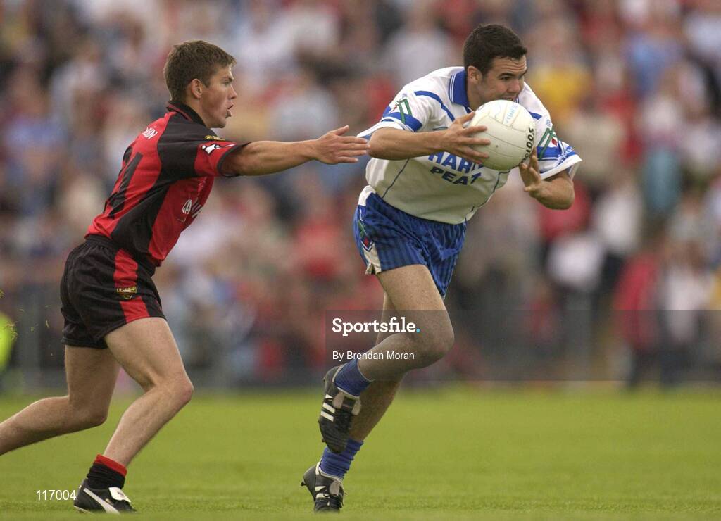 8 June 2003; Paul Finlay of Monaghan in action against Ronan Sexton of Down during the Bank of Ireland Ulster Senior Football Championship Quarter-Final match between Down and Monaghan at Casement Park in Belfast. Photo by Brendan Moran/Sportsfile