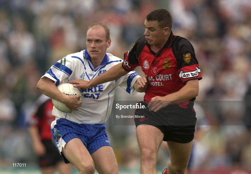 8 June 2003; Jason Hughes of Monaghan in action against Sean Ward of Down during the Bank of Ireland Ulster Senior Football Championship Quarter-Final match between Down and Monaghan at Casement Park in Belfast. Photo by Brendan Moran/Sportsfile