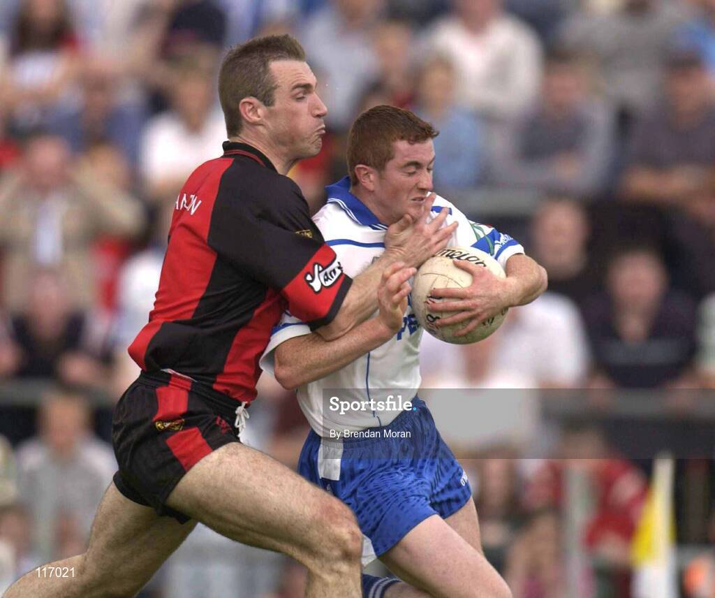 8 June 2003; Thomas Freeman of Monaghan in action against Brian Burns of Down during the Bank of Ireland Ulster Senior Football Championship Quarter-Final match between Down and Monaghan at Casement Park in Belfast. Photo by Brendan Moran/Sportsfile