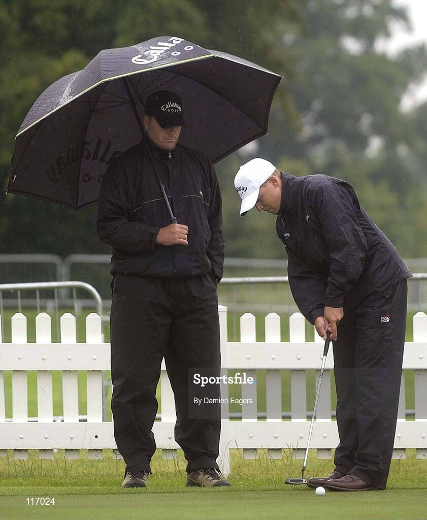30 June 2003; Niclas Fasth of Sweden practices his putting, with his caddie Jesse Carlsson, on the practice putting green in preparation for The Smurfit European Open at the K Club in Straffan, Kildare. Photo by Damien Eagers/Sportsfile