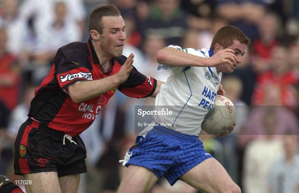 8 June 2003; Thomas Freeman of Monaghan in action against Brian Burns of Down during the Bank of Ireland Ulster Senior Football Championship Quarter-Final match between Down and Monaghan at Casement Park in Belfast. Photo by Brendan Moran/Sportsfile