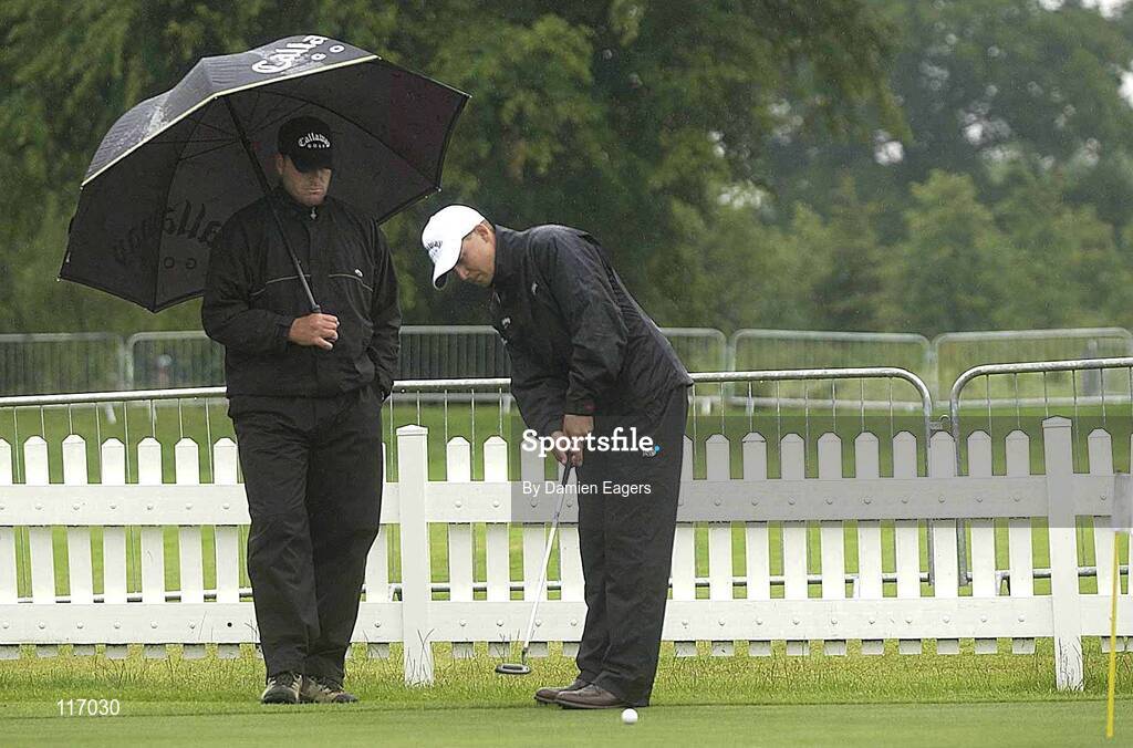 30 June 2003; Niclas Fasth of Sweden practices his putting, with his caddie Jesse Carlsson, on the practice putting green in preparation for The Smurfit European Open at the K Club in Straffan, Kildare. Photo by Damien Eagers/Sportsfile