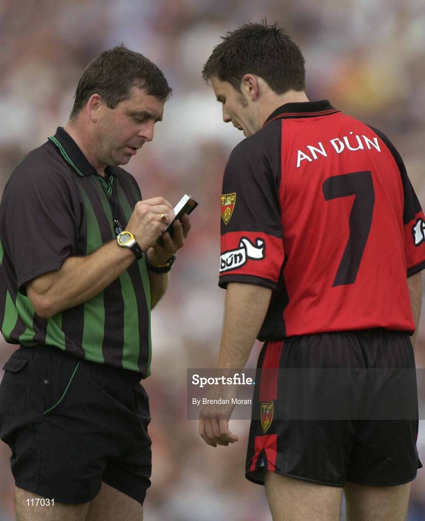 8 June 2003; Martin Cole of Down has his name taken by referee Eugene Murtagh before being shown a yellow card during the Bank of Ireland Ulster Senior Football Championship Quarter-Final match between Down and Monaghan at Casement Park in Belfast. Photo by Brendan Moran/Sportsfile