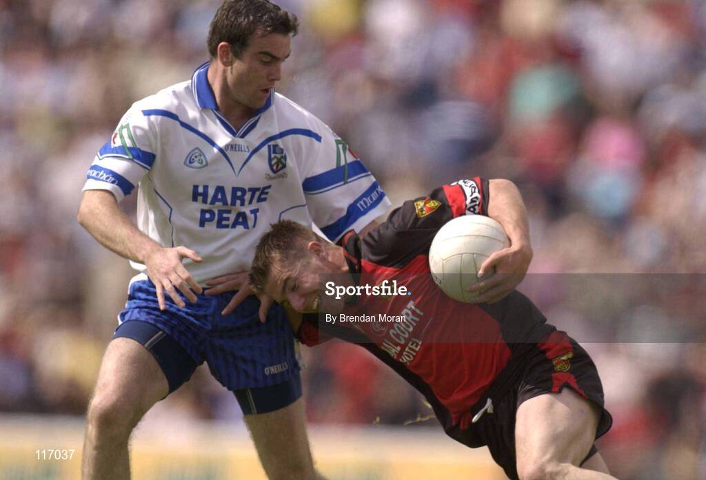 8 June 2003; Ronan Murtagh of Down in action against John Paul Mone of Monaghan during the Bank of Ireland Ulster Senior Football Championship Quarter-Final match between Down and Monaghan at Casement Park in Belfast. Photo by Brendan Moran/Sportsfile