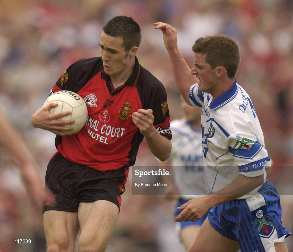 8 June 2003; Dan Gordon of Down in action against Damian McKenna of Monaghan during the Bank of Ireland Ulster Senior Football Championship Quarter-Final match between Down and Monaghan at Casement Park in Belfast. Photo by Brendan Moran/Sportsfile