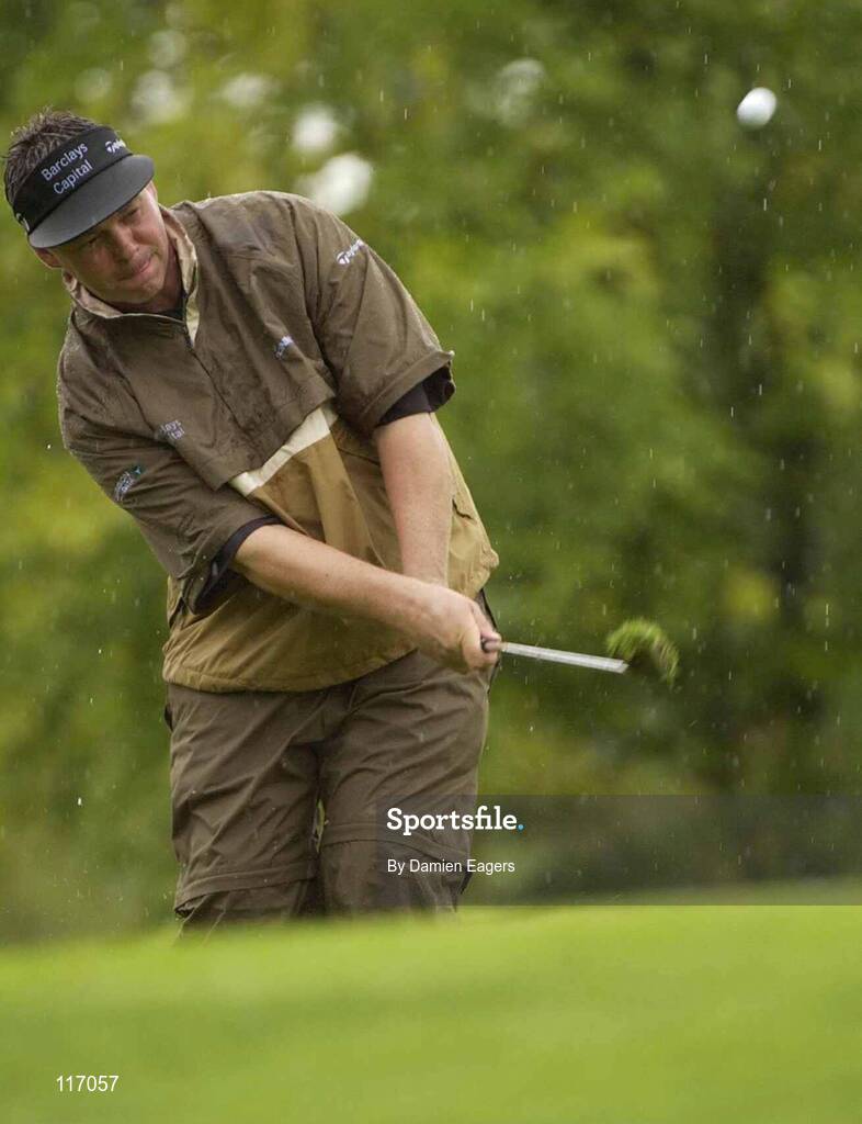 30 June 2003; Darren Clarke of Northern Ireland chips on to the 1st green during a practice round in preparation for The Smurfit European Open at the K Club in Straffan, Kildare. Photo by Damien Eagers/Sportsfile