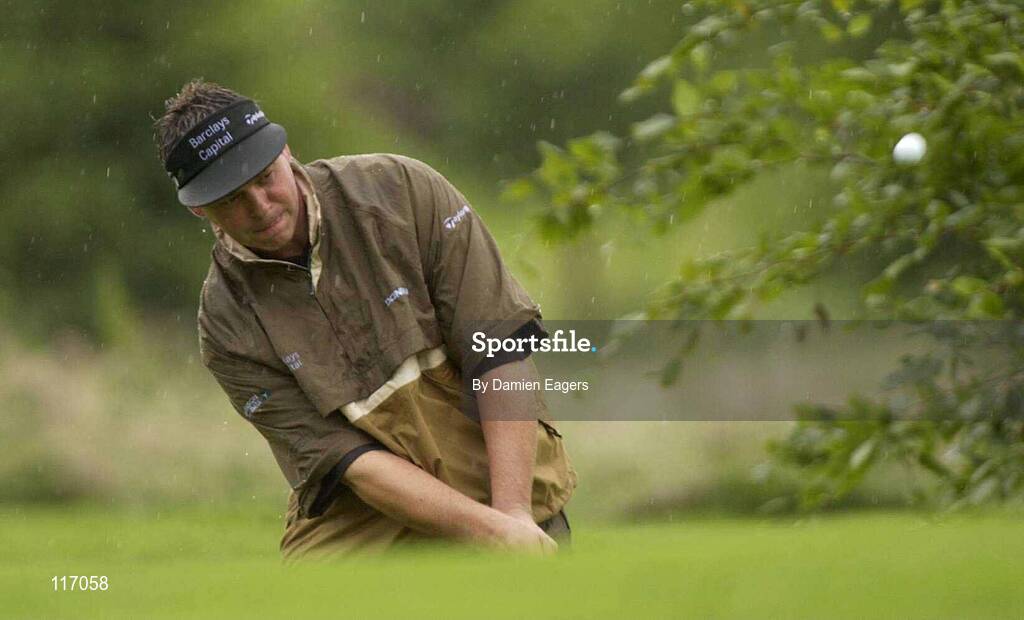 30 June 2003; Darren Clarke of Northern Ireland chips on to the 1st green during a practice round in preparation for The Smurfit European Open at the K Club in Straffan, Kildare. Photo by Damien Eagers/Sportsfile