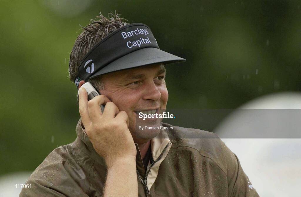 30 June 2003; Darren Clarke of Northern Ireland on a phone call during a practice round in preparation for The Smurfit European Open at the K Club in Straffan, Kildare. Photo by Damien Eagers/Sportsfile