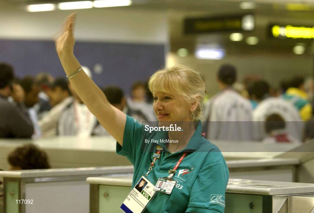 30 June 2003; Volunteer Eleanor Boyle waves as Special Olympics Athletes return to their home countries after competing in the 2003 Special Olympics World Games. Photo by Ray McManus/Sportsfile