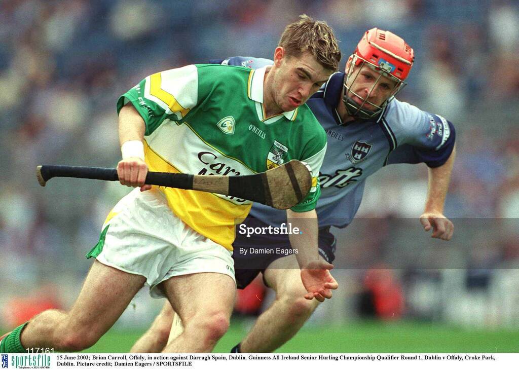 15 June 2003; Brian Carroll of Offaly in action against Darragh Spain of Offaly during the Guinness All Ireland Hurling Championship Qualifier Round 1 match between Dublin and Offaly at Croke Park in Dublin. Photo by Damien Eagers/Sportsfile