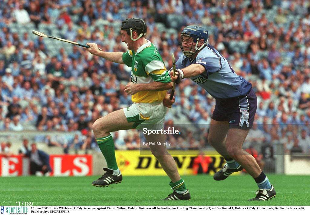 15 June 2003; Brian Whelehan of Offaly in action against Ciaran Wilson of Dublin during the Guinness All Ireland Hurling Championship Qualifier Round 1 match between Dublin and Offaly at Croke Park in Dublin. Photo by Pat Murphy/Sportsfile