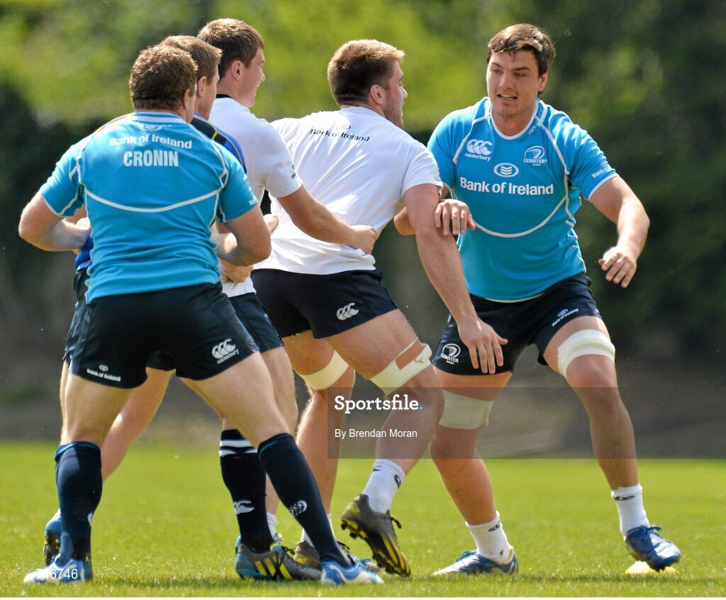 6 May 2013; Leinster's Quinn Roux in action against team-mates Sean Cronin, Brian O'Driscoll, Luke McGrath and Dominic Ryan during squad training ahead of their side's Celtic League Play-off match against Glasgow Warriors on Saturday May 11th. Leinster Rugby Squad Training and Media Briefing, Rosemount, UCD, Belfield, Dublin. Picture credit: Brendan Moran / SPORTSFILE
