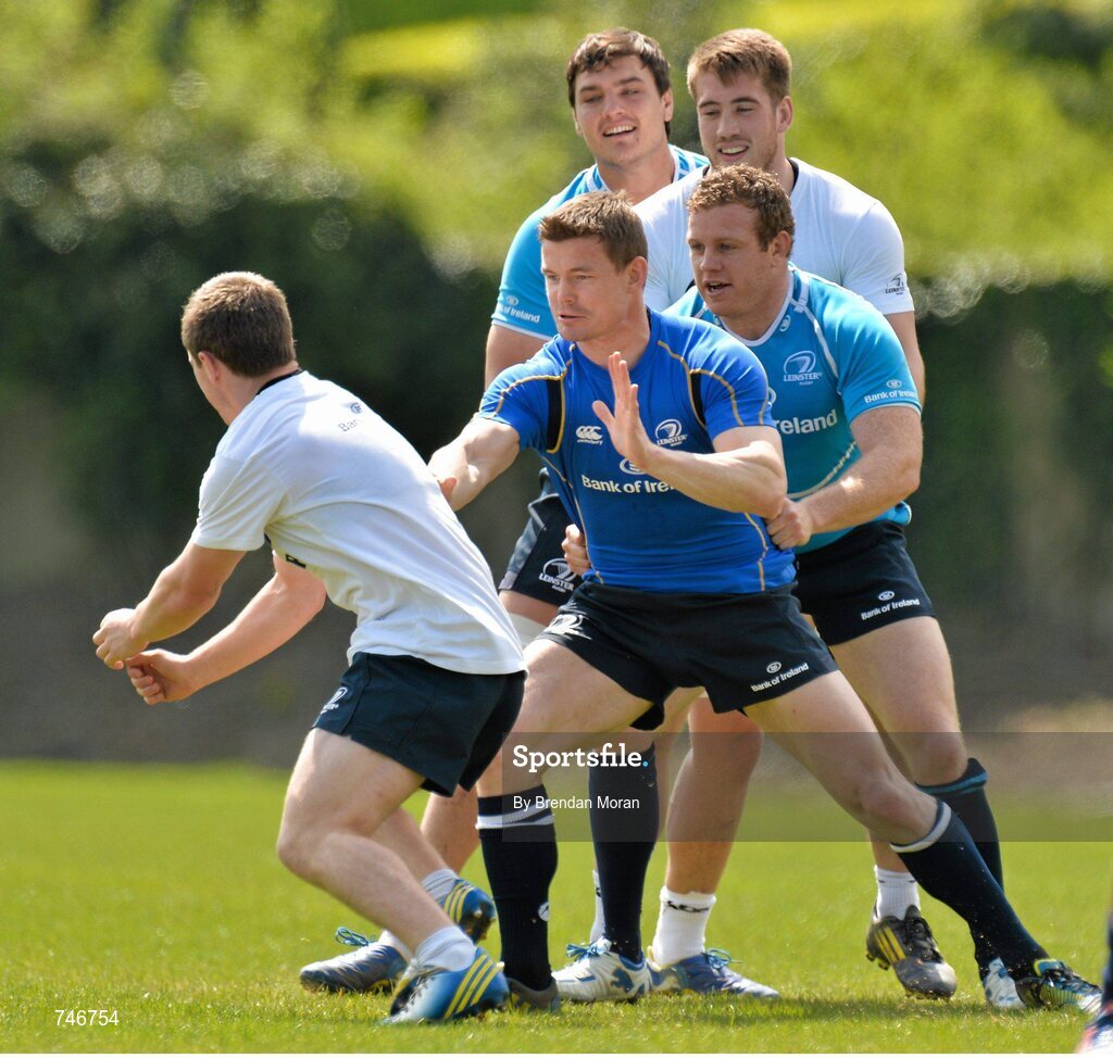 6 May 2013; Leinster's Luke McGrath in action against team-mates  Brian O'Driscoll, Sean Cronin, Dominic Ryan and Quinn Roux during squad training ahead of their side's Celtic League Play-off match against Glasgow Warriors on Saturday May 11th. Leinster Rugby Squad Training and Media Briefing, Rosemount, UCD, Belfield, Dublin. Picture credit: Brendan Moran / SPORTSFILE
