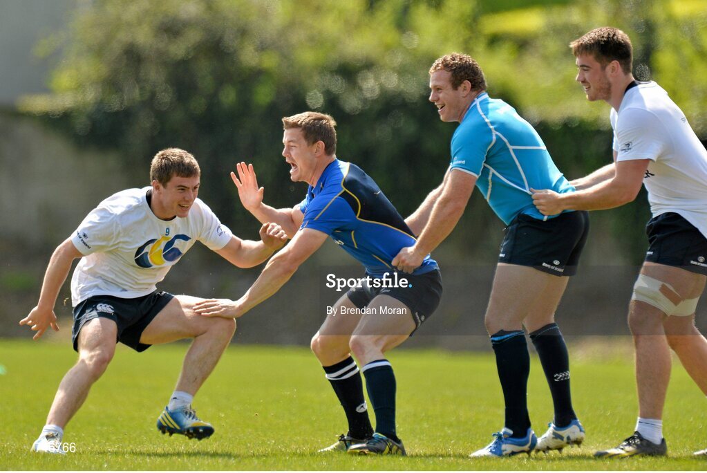 6 May 2013; Leinster's Luke McGrath, left, in action against team-mates Brian O'Driscoll, Sean Cronin and Dominic Ryan during squad training ahead of their side's Celtic League Play-off match against Glasgow Warriors on Saturday May 11th. Leinster Rugby Squad Training and Media Briefing, Rosemount, UCD, Belfield, Dublin. Picture credit: Brendan Moran / SPORTSFILE