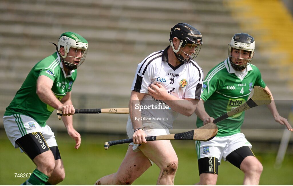 11 May 2013; Sean Hennessy, Warwickshire, in action against Colum Rice and Eoin Mahon, Fermanagh. Lory Meagher Cup, Round 2, Fermanagh v Warwickshire, Brewster Park, Enniskillen, Co. Fermanagh. Picture credit: Oliver McVeigh / SPORTSFILE