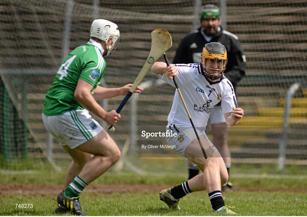11 May 2013; Chris Brough, Warwickshire, in action against Shea Curran, Fermanagh. Lory Meagher Cup, Round 2, Fermanagh v Warwickshire, Brewster Park, Enniskillen, Co. Fermanagh. Picture credit: Oliver McVeigh / SPORTSFILE