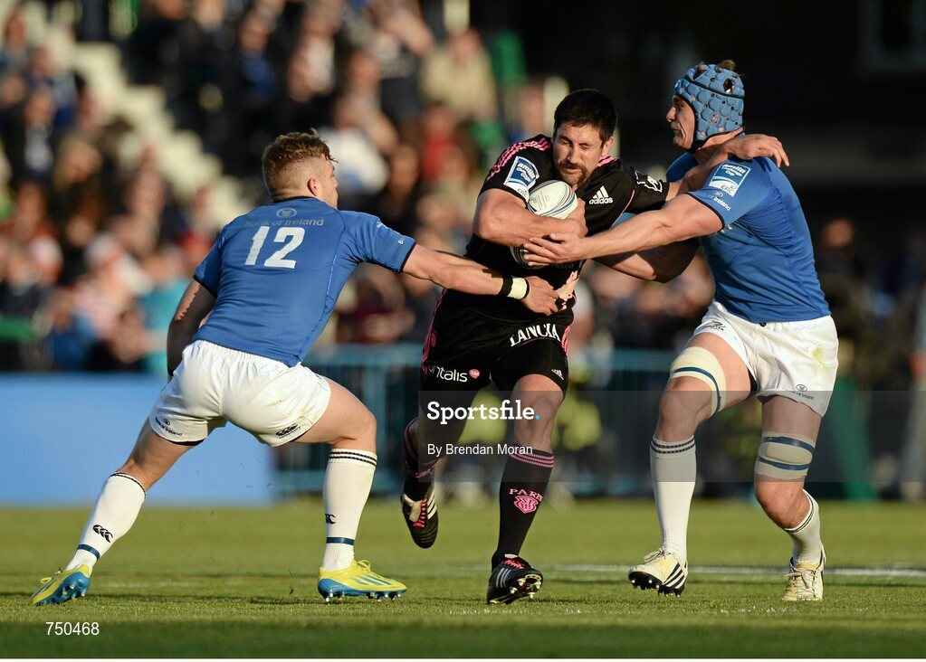 17 May 2013; Paul Williams, Stade Francais, is tackled by Ian Madigan, left, and Rhys Ruddock, Leinster. Amlin Challenge Cup Final 2012/13, Leinster v Stade Francais, RDS, Ballsbridge, Dublin. Picture credit: Brendan Moran / SPORTSFILE