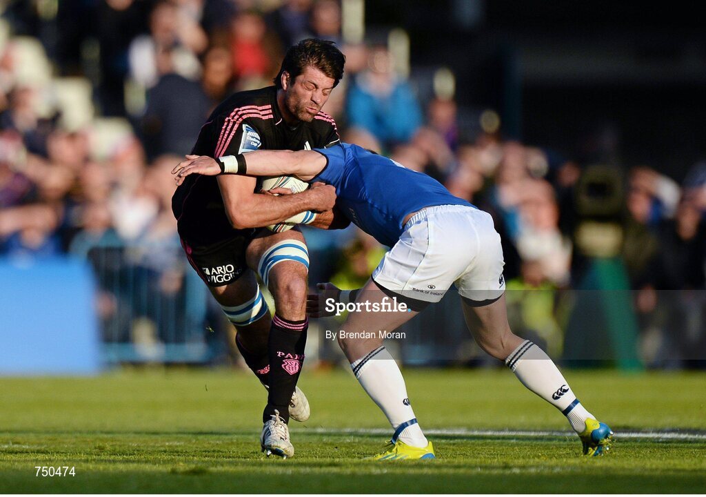 17 May 2013; Pierre Rabadan, Stade Francais, is tackled by Ian Madigan, Leinster. Amlin Challenge Cup Final 2012/13, Leinster v Stade Francais, RDS, Ballsbridge, Dublin. Picture credit: Brendan Moran / SPORTSFILE