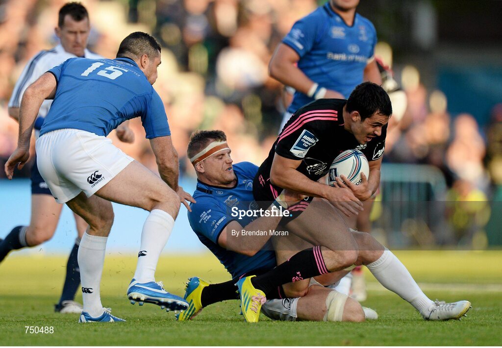 17 May 2013; Geoffrey Doumayrou, Stade Francais, is tackled by Jamie Heaslip, Leinster. Amlin Challenge Cup Final 2012/13, Leinster v Stade Francais, RDS, Ballsbridge, Dublin. Picture credit: Brendan Moran / SPORTSFILE