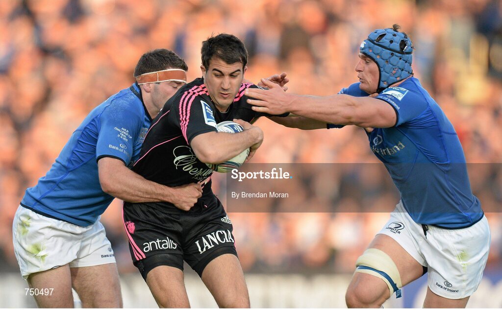 17 May 2013; Jérôme Porical, Stade Francais, is tackled by Fergus McFadden, left, and Rhys Ruddock, Leinster. Amlin Challenge Cup Final 2012/13, Leinster v Stade Francais, RDS, Ballsbridge, Dublin. Picture credit: Brendan Moran / SPORTSFILE
