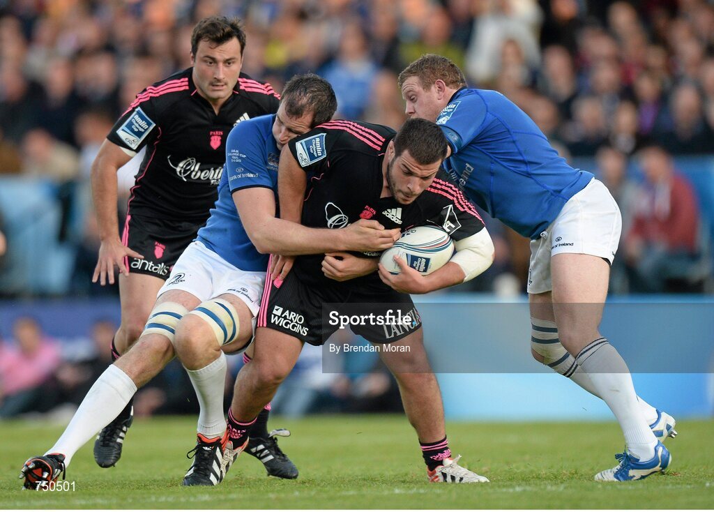 17 May 2013; Rabah Slimani, Stade Francais, is tackled by Devin Toner, left, and Sean Cronin, Leinster. Amlin Challenge Cup Final 2012/13, Leinster v Stade Francais, RDS, Ballsbridge, Dublin. Picture credit: Brendan Moran / SPORTSFILE
