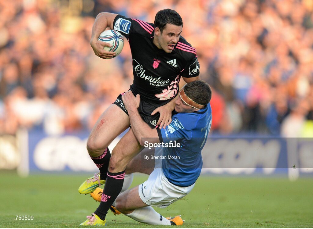 17 May 2013; Geoffrey Doumayrou, Stade Francais, is tackled by Fergus McFadden, Leinster. Amlin Challenge Cup Final 2012/13, Leinster v Stade Francais, RDS, Ballsbridge, Dublin. Picture credit: Brendan Moran / SPORTSFILE