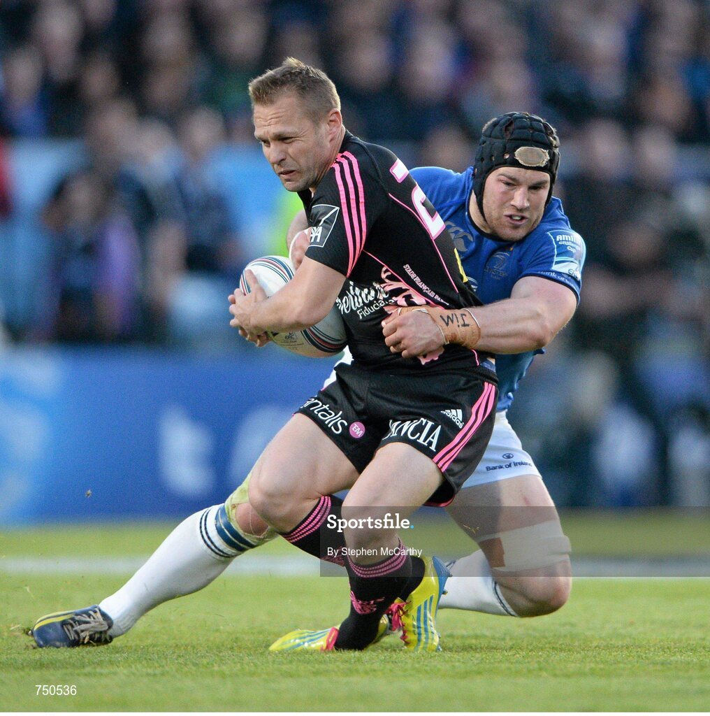 17 May 2013; Paul Warwick, Stade Francais, is tackled by Sean O'Brien, Leinster. Amlin Challenge Cup Final 2012/13, Leinster v Stade Francais, RDS, Ballsbridge, Dublin. Picture credit: Stephen McCarthy / SPORTSFILE