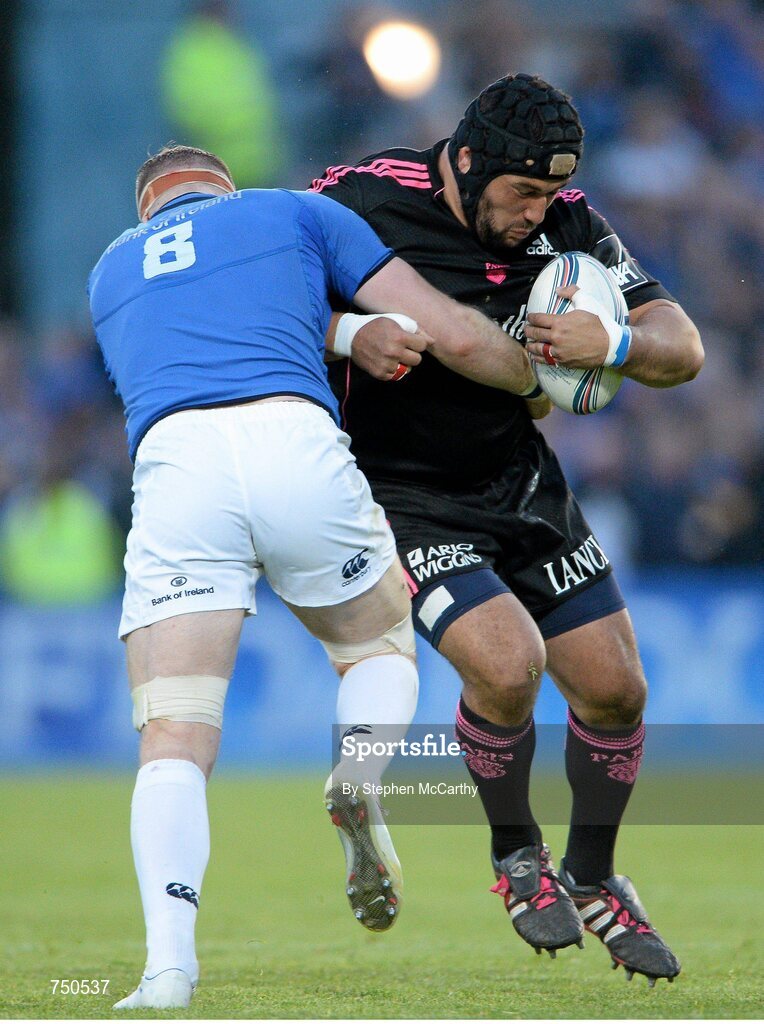 17 May 2013; Stan Wright, Stade Francais, is tackled by Jamie Heaslip, Leinster. Amlin Challenge Cup Final 2012/13, Leinster v Stade Francais, RDS, Ballsbridge, Dublin. Picture credit: Stephen McCarthy / SPORTSFILE