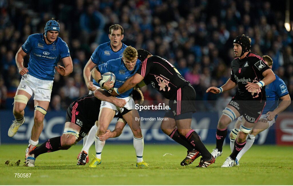 17 May 2013; Ian Madigan, Leinster, is tackled by David Lyons, left, and Stan Wright, Stade Francais. Amlin Challenge Cup Final 2012/13, Leinster v Stade Francais, RDS, Ballsbridge, Dublin. Picture credit: Brendan Moran / SPORTSFILE